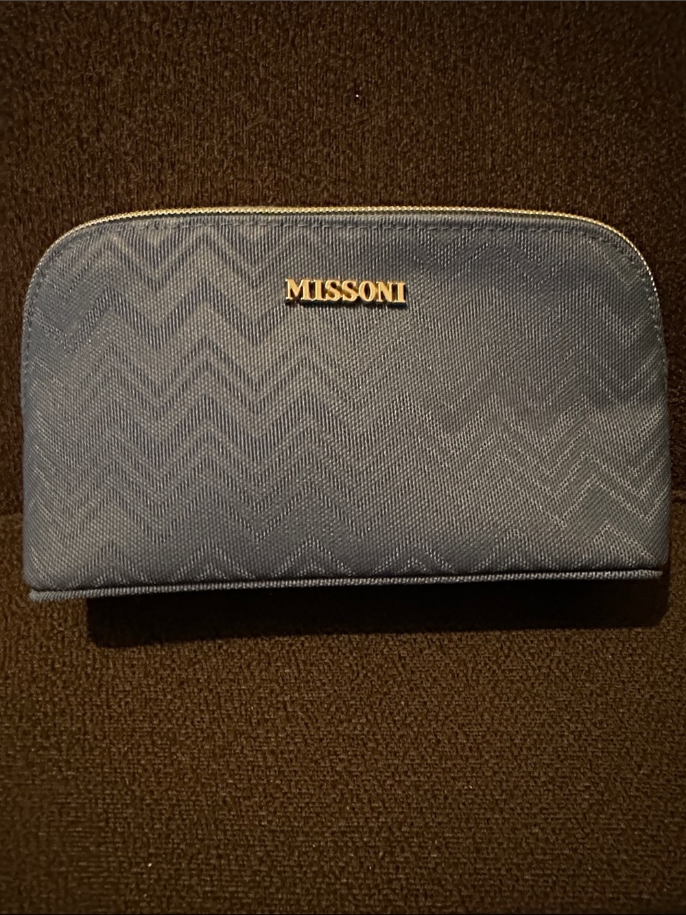 Missoni x Delta Blue Chevron Zip Pouch with Gold Logo. L 8” x W 5”. Like New.